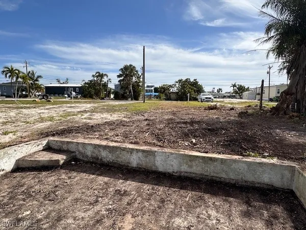 a view of a yard with an outdoor space