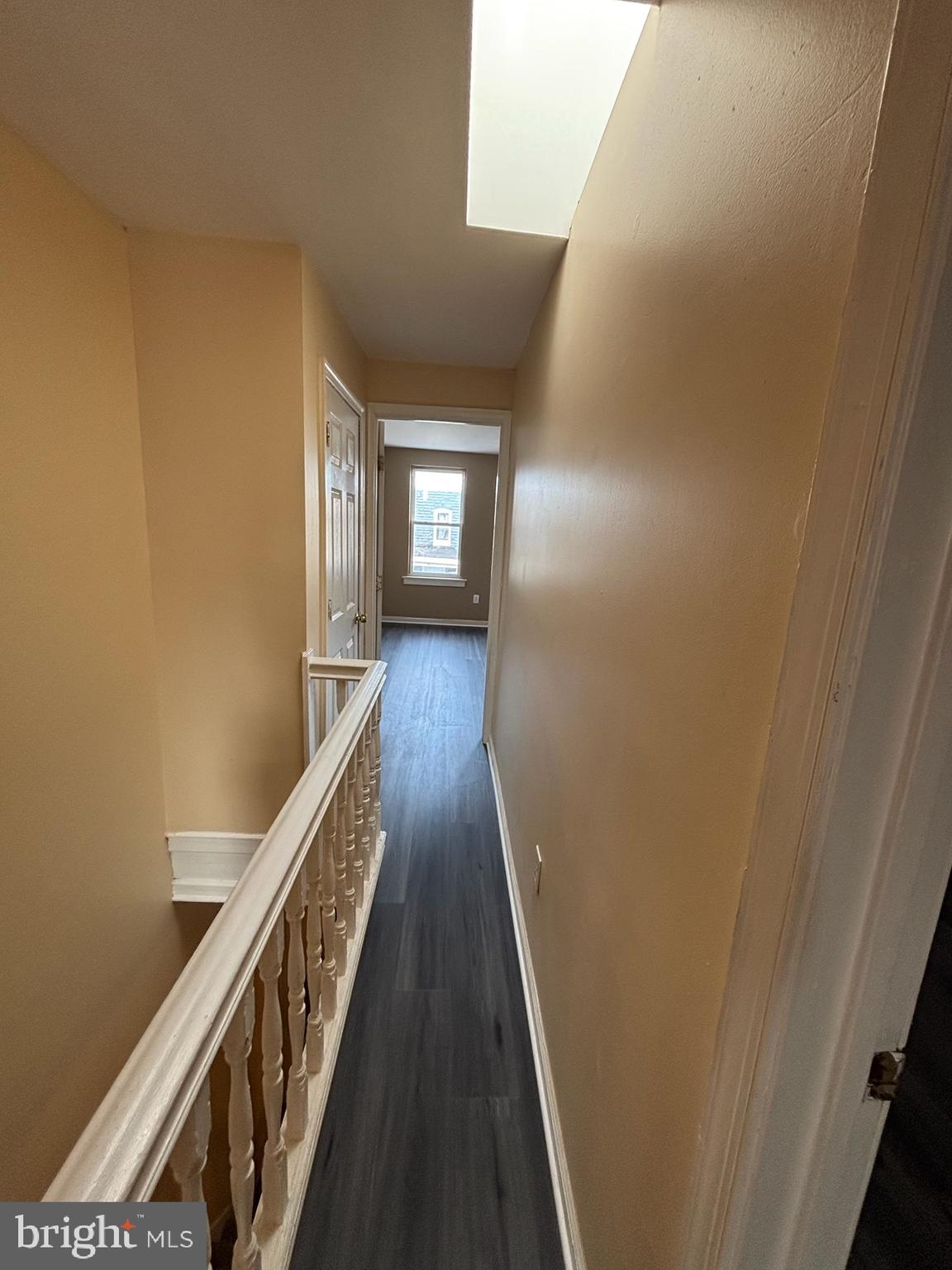 1633 Normal Avenue Baltimore, MD 21213 - Photo 14 of 17 Hallway w/ Skylight