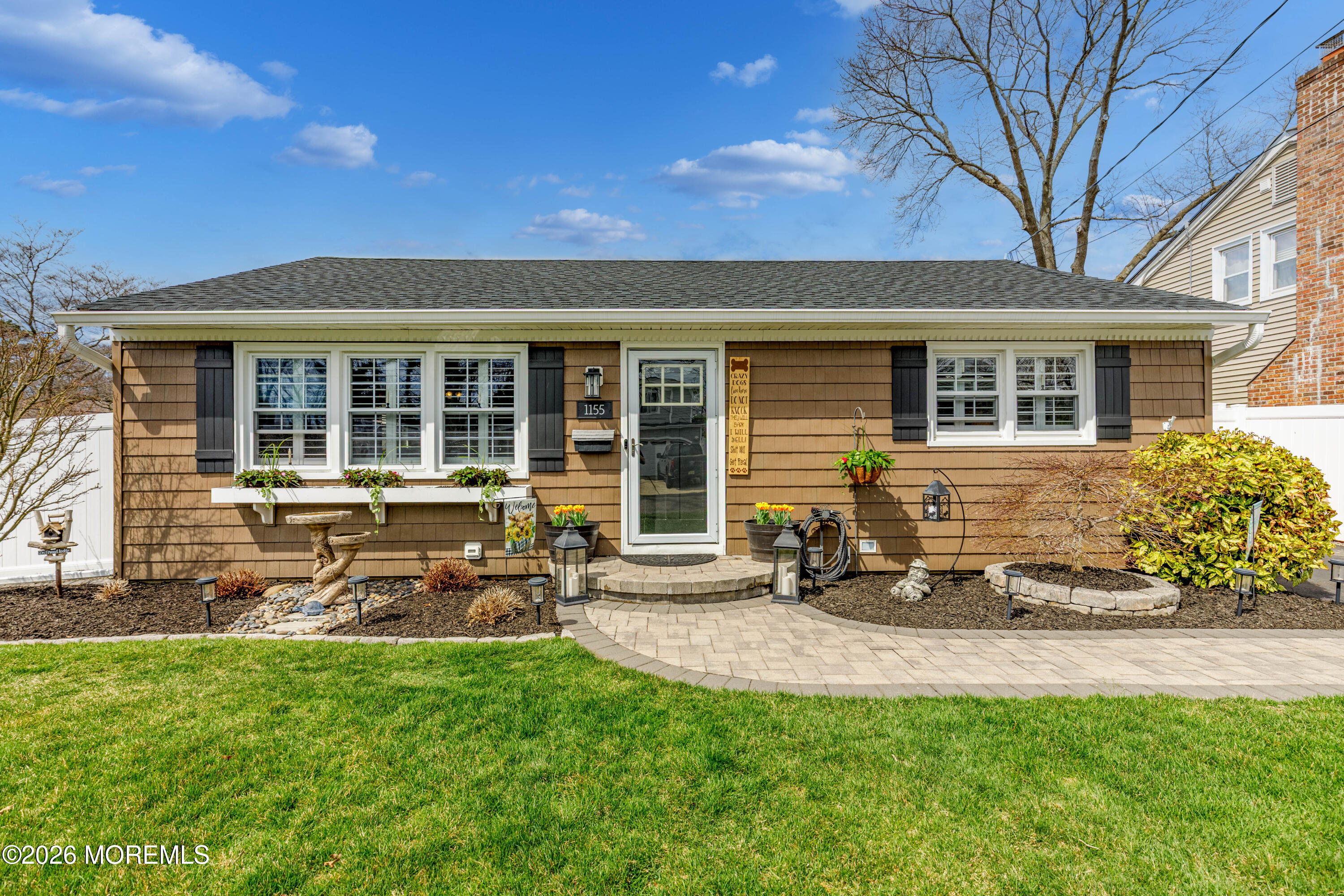 1155 Lockhart Lane Point Pleasant, NJ 08742 - Photo 2 of 33 front view of a house with a yard