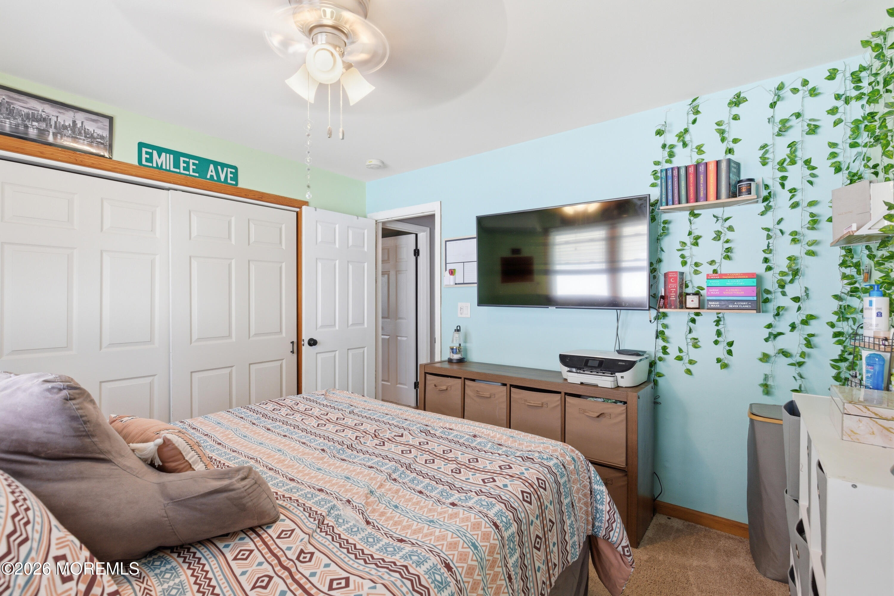 1155 Lockhart Lane Point Pleasant, NJ 08742 - Photo 21 of 33 a bedroom with a bed and a flat screen tv