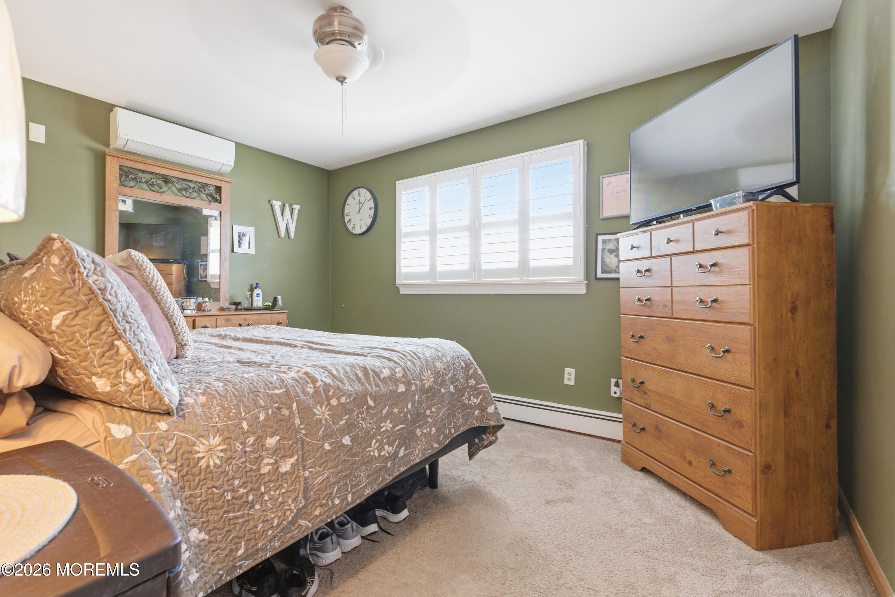 1155 Lockhart Lane Point Pleasant, NJ 08742 - Photo 22 of 33 a bedroom with a bed and a window