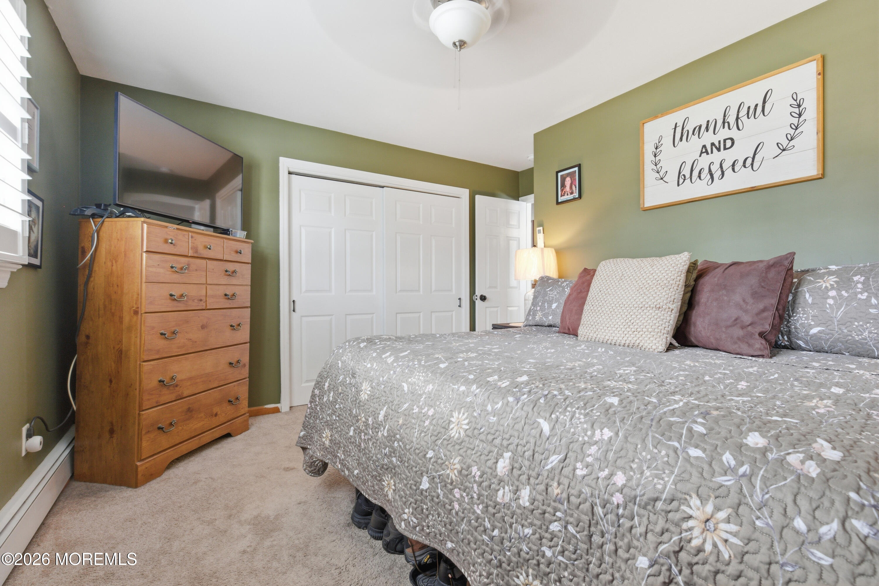 1155 Lockhart Lane Point Pleasant, NJ 08742 - Photo 23 of 33 a bedroom with a bed and a dresser