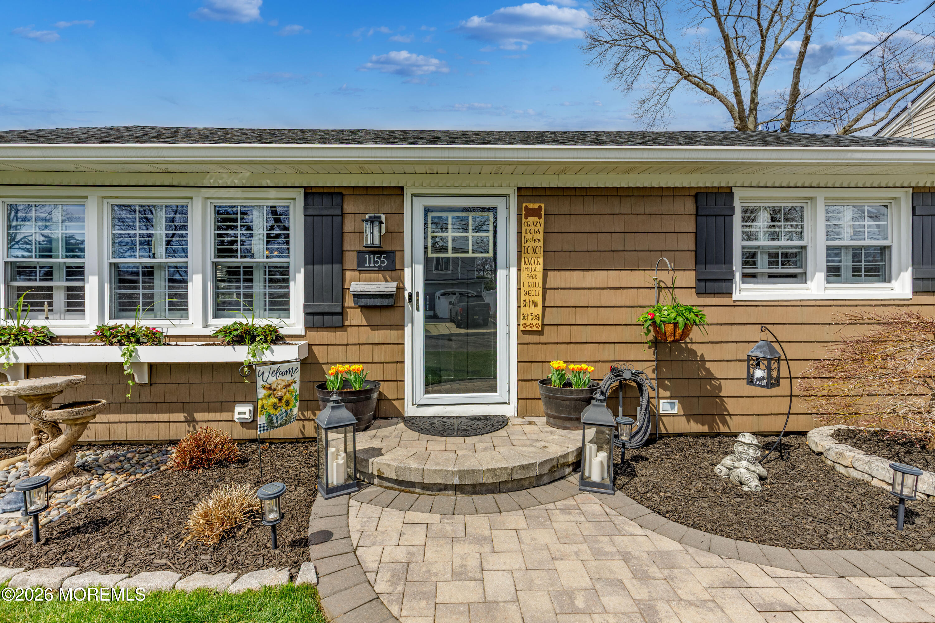 1155 Lockhart Lane Point Pleasant, NJ 08742 - Photo 3 of 33 a front view of a house with sitting area