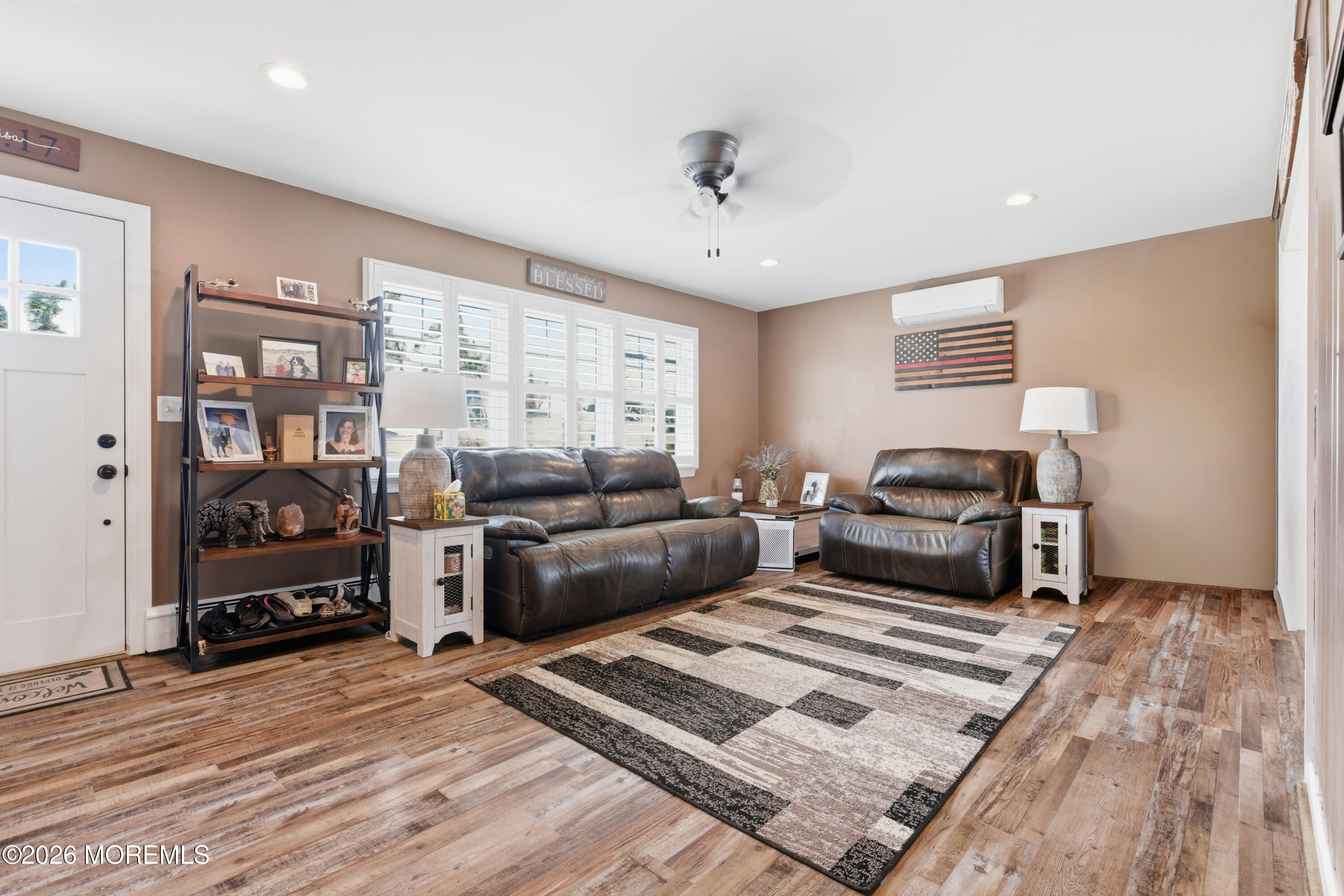 1155 Lockhart Lane Point Pleasant, NJ 08742 - Photo 8 of 33 a living room with furniture and a rug