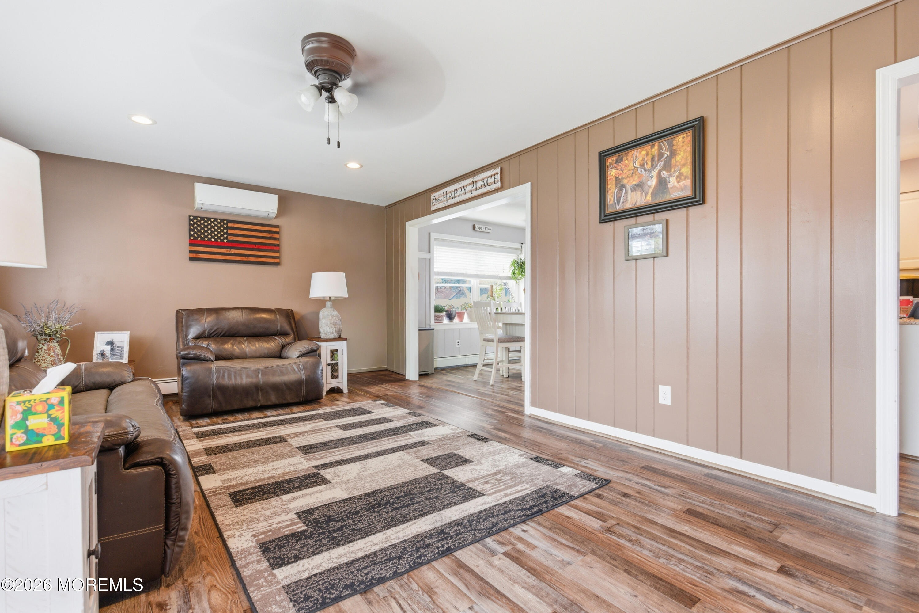 1155 Lockhart Lane Point Pleasant, NJ 08742 - Photo 10 of 33 a bedroom with a bed and wooden floor