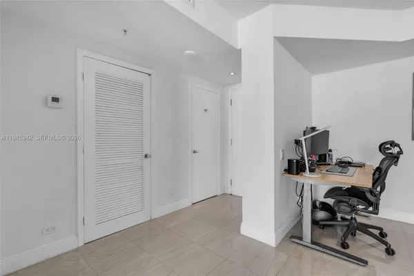 a utility room with washer and dryer