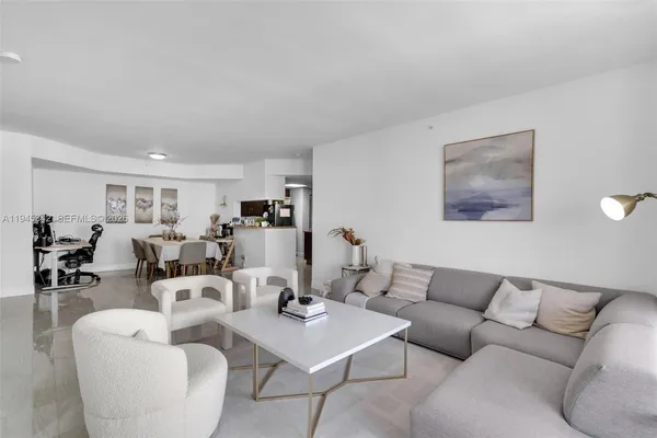 a living room with furniture and window