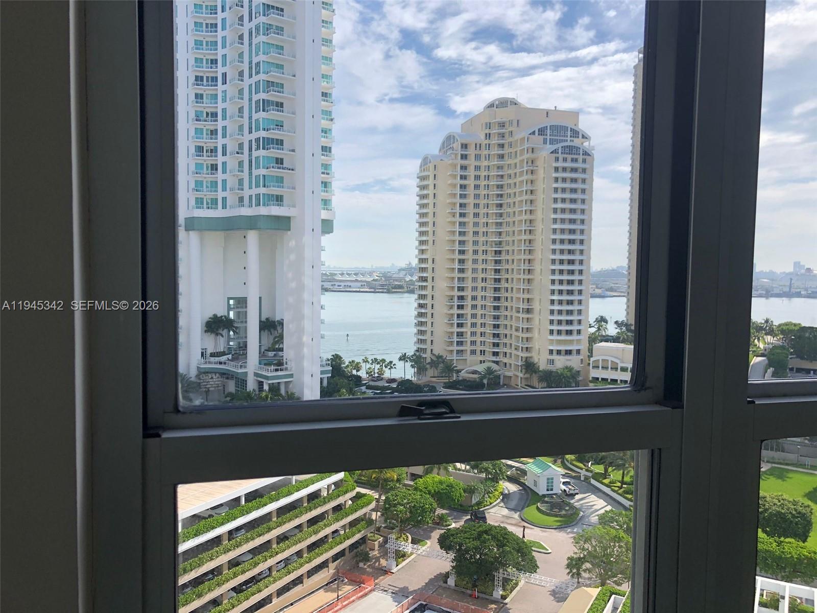 701 Brickell Key Boulevard, Unit 1606 Miami, FL 33131 - Photo 7 of 8 a picture of a window of the house