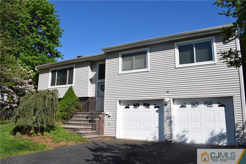 10 Harper Road Monmouth Junction, NJ 08852 - Photo 2 of 24 a front view of a house with a garden