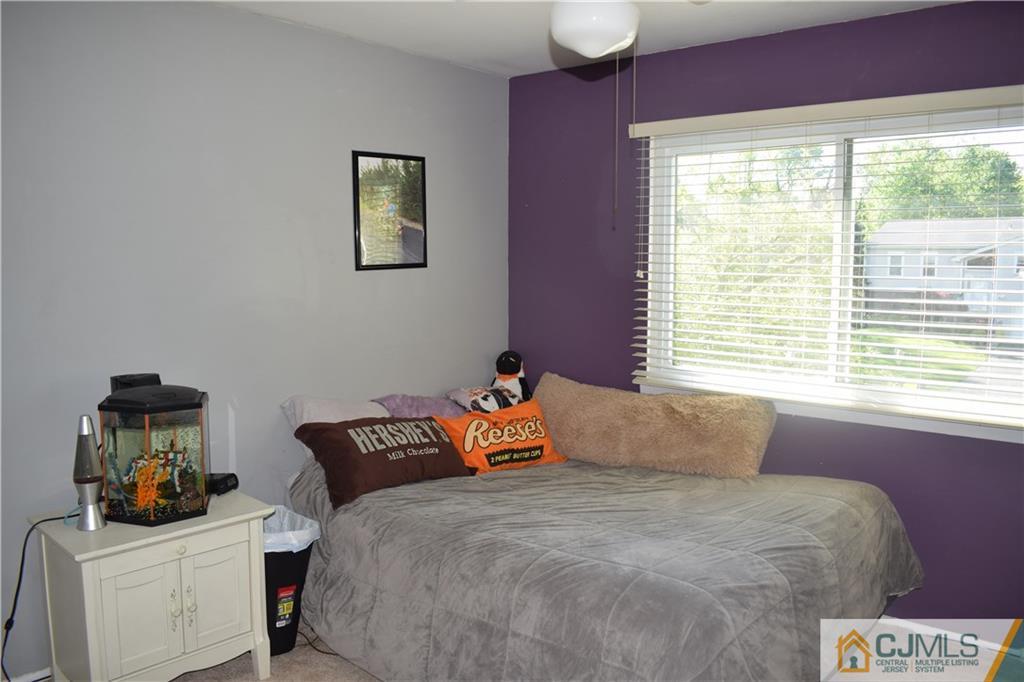 10 Harper Road Monmouth Junction, NJ 08852 - Photo 13 of 24 a bedroom with a bed and window