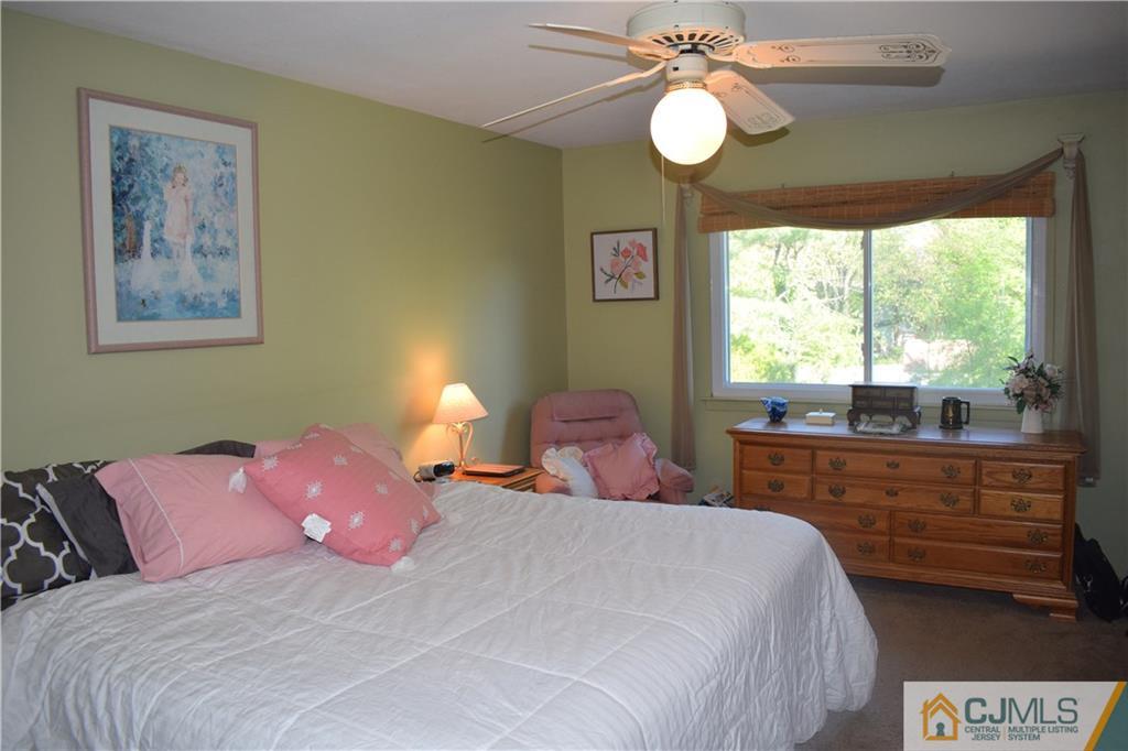 10 Harper Road Monmouth Junction, NJ 08852 - Photo 16 of 24 a bedroom with a bed and a window