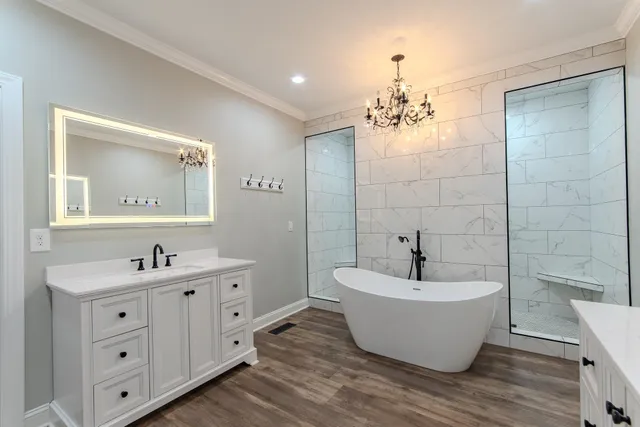 a spacious bedroom with a bed and furniture