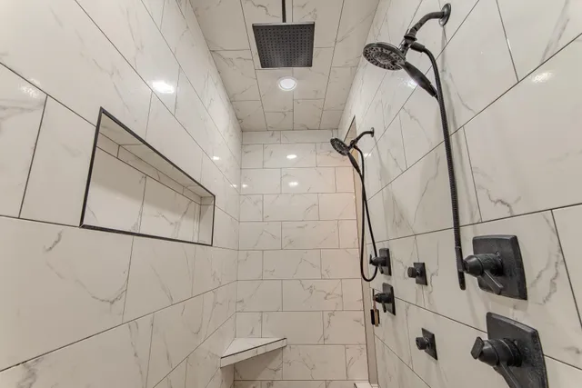 a bathroom with a bathtub and sink