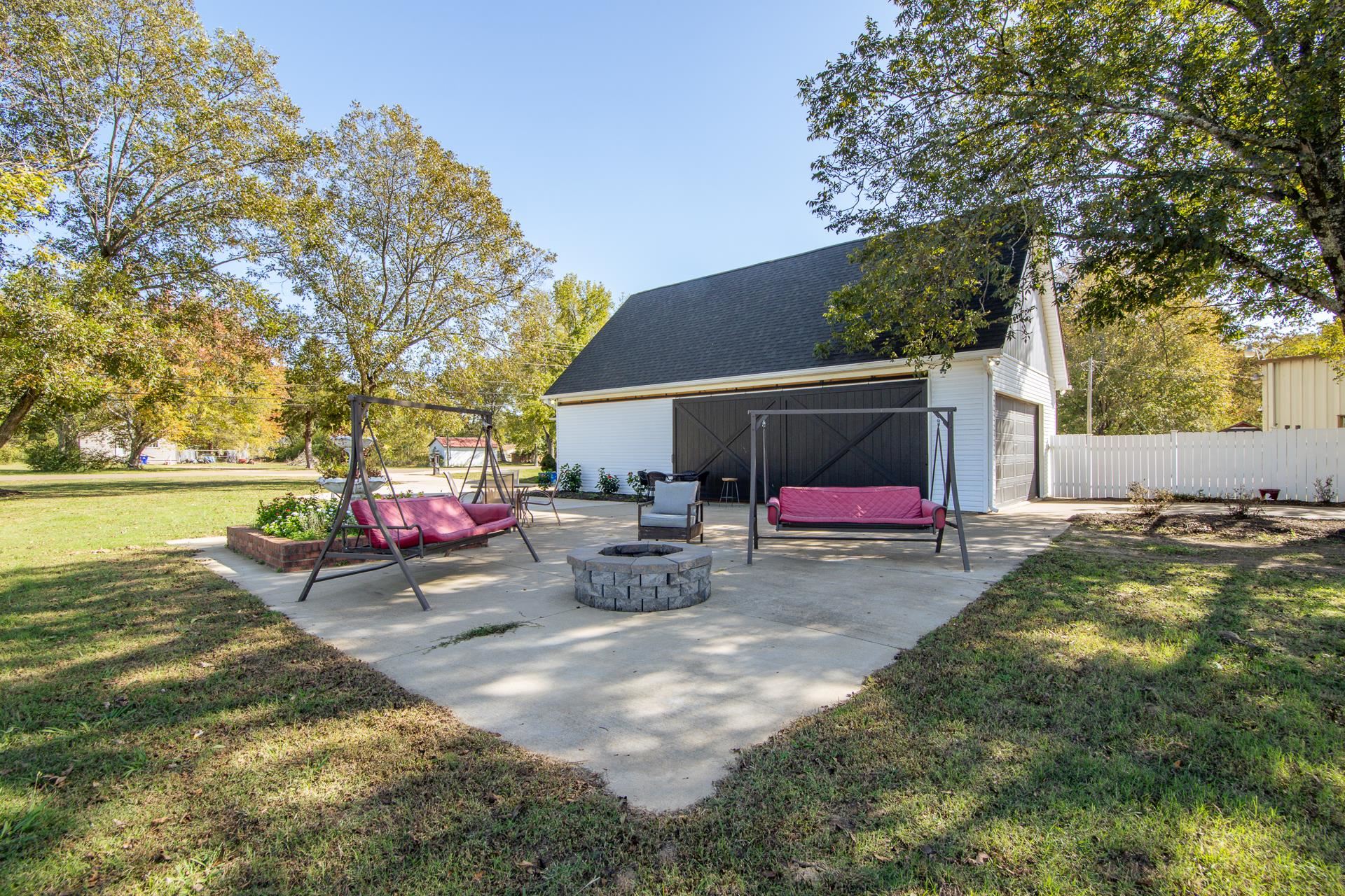 635 Patterson Road Savannah, TN 38372 - Photo 30 of 33 a view of a house with backyard and sitting area