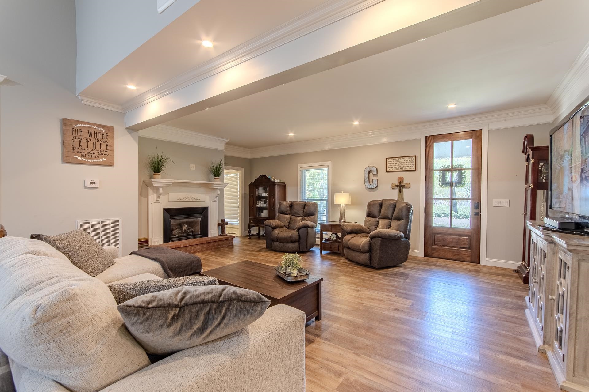 635 Patterson Road Savannah, TN 38372 - Photo 7 of 33 a living room with furniture and a fireplace
