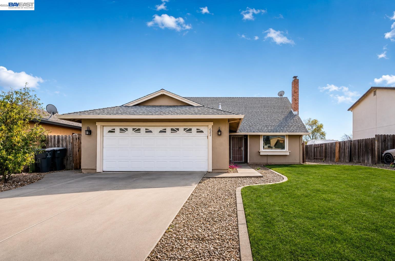 621 Chyrl Way Suisun City, CA 94585 - Photo 1 of 3 a front view of a house with a yard and garage