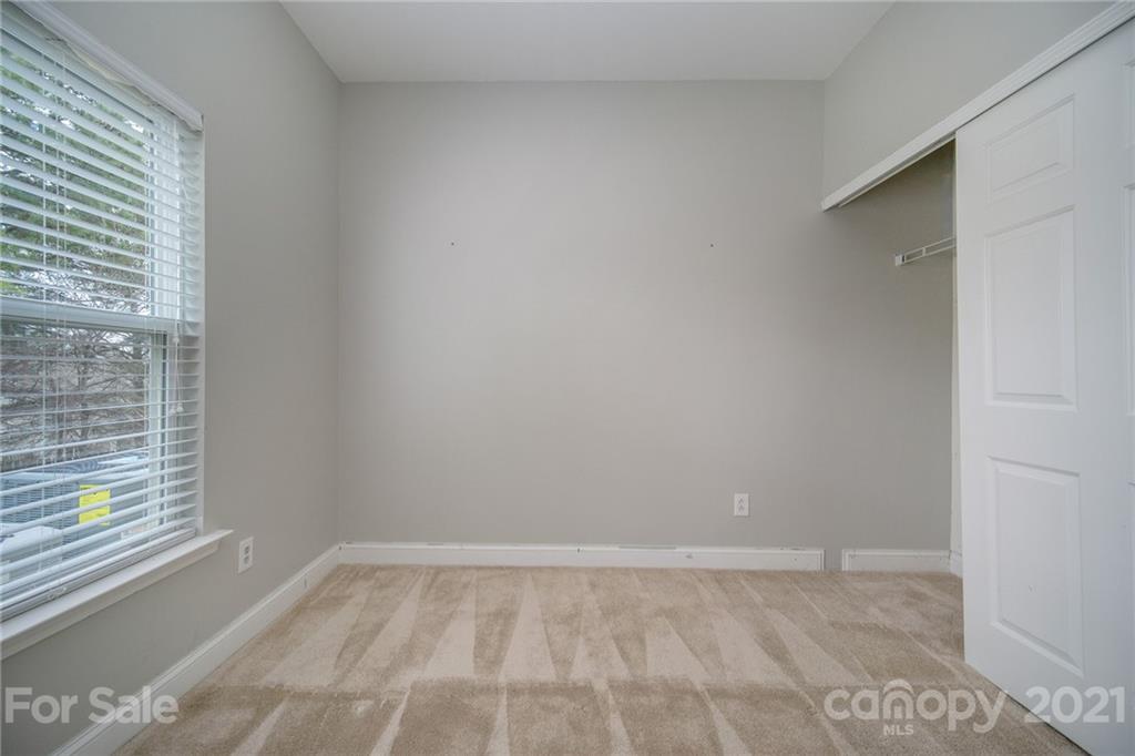382 Primrose Walk Fort Mill, SC 29715 - Photo 13 of 20 a view of an empty room with a window