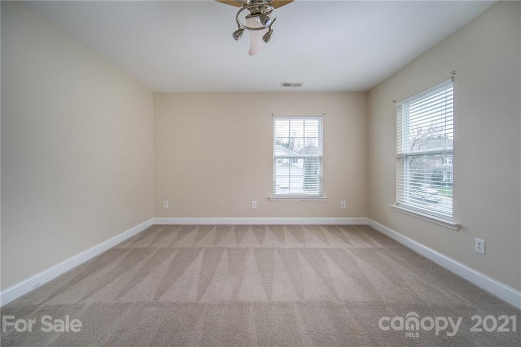 382 Primrose Walk Fort Mill, SC 29715 - Photo 14 of 20 an empty room with a window