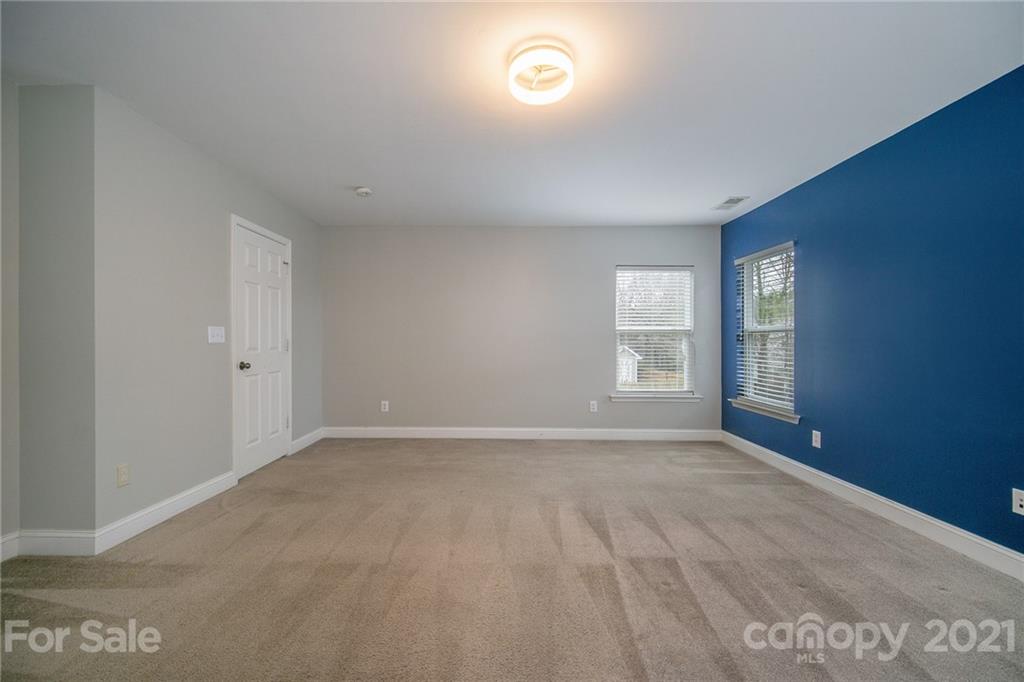 382 Primrose Walk Fort Mill, SC 29715 - Photo 15 of 20 a view of an empty room with window
