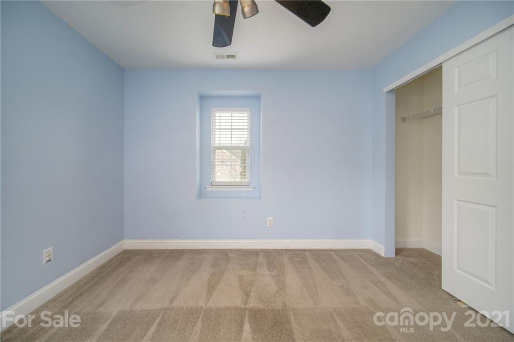 382 Primrose Walk Fort Mill, SC 29715 - Photo 20 of 20 an empty room with windows