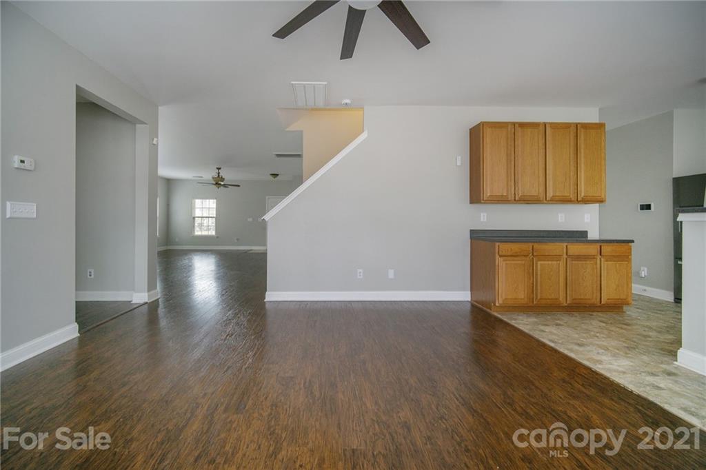 382 Primrose Walk Fort Mill, SC 29715 - Photo 10 of 20 a view of empty room with wooden floor