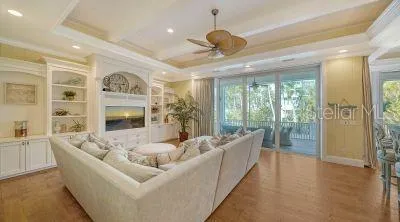 a view of a kitchen with a sink and wooden floor