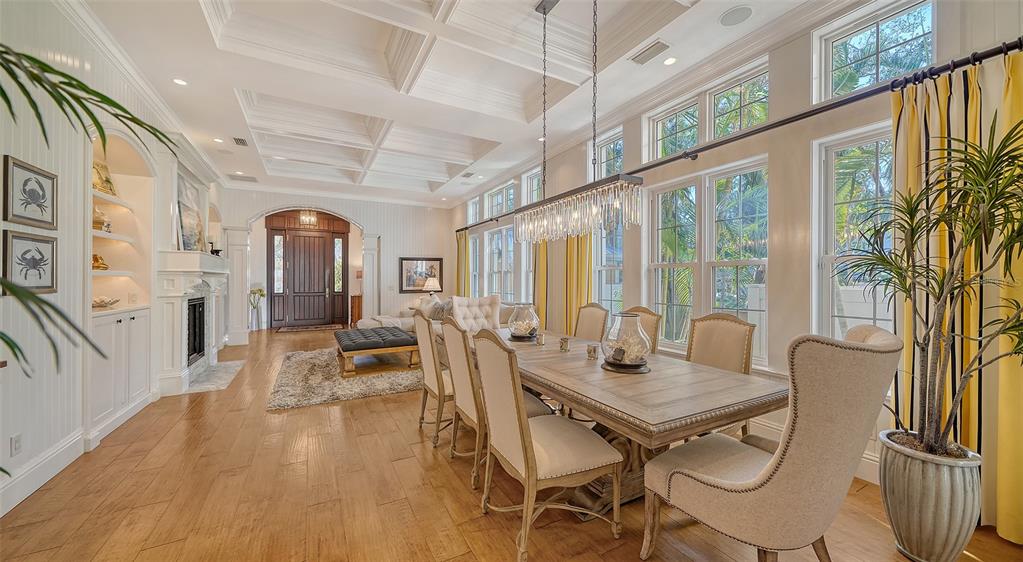 5309 Hidden Harbor Road Sarasota, FL 34242 - Photo 21 of 100 a view of a dining room with furniture window and wooden floor