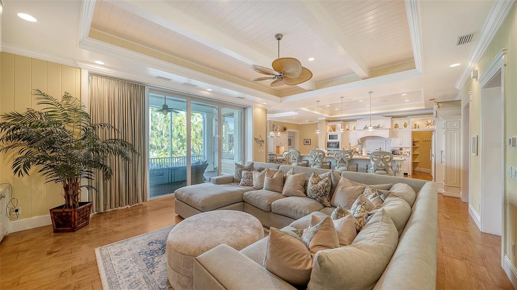 5309 Hidden Harbor Road Sarasota, FL 34242 - Photo 23 of 100 a living room with furniture and a large window