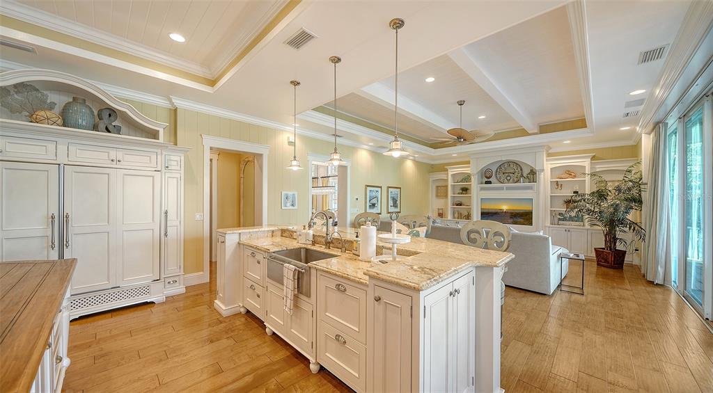 5309 Hidden Harbor Road Sarasota, FL 34242 - Photo 27 of 100 a large white kitchen with a large window