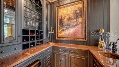 5309 Hidden Harbor Road Sarasota, FL 34242 - Photo 34 of 88 a kitchen with a sink and large window