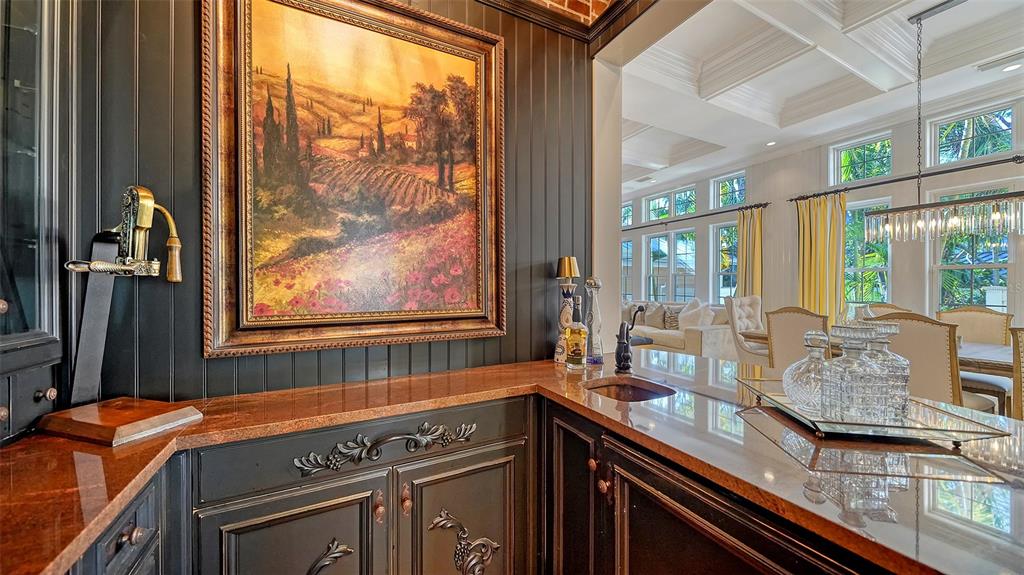 5309 Hidden Harbor Road Sarasota, FL 34242 - Photo 36 of 100 a kitchen with granite countertop a stove and a sink
