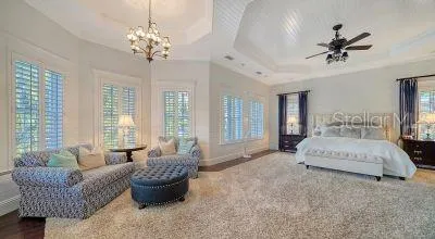 a view of walk in closet with clothes