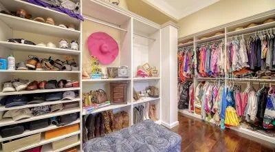 a bed room with a bed and a window