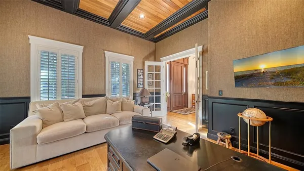 a view of a balcony with wooden floor