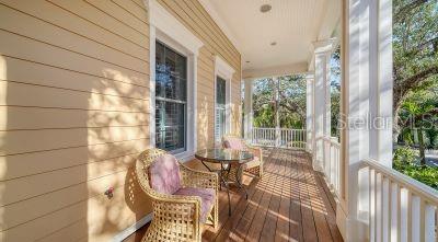 5309 Hidden Harbor Road Sarasota, FL 34242 - Photo 5 of 88 a view of balcony with two chairs and a table