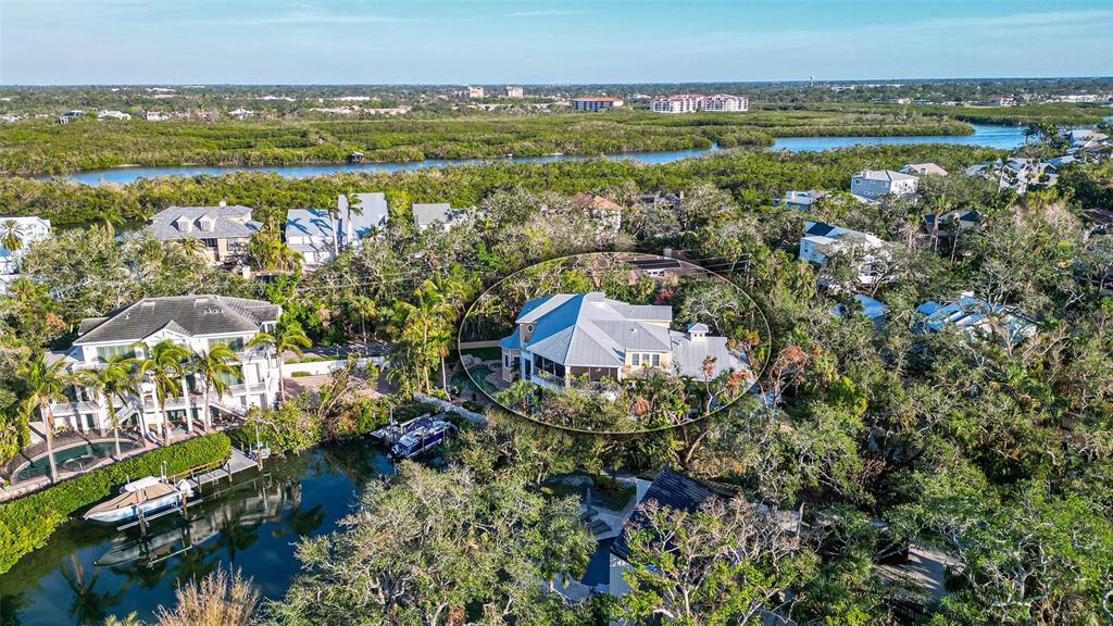 5309 Hidden Harbor Road Sarasota, FL 34242 - Photo 6 of 100 an aerial view of beach and residential houses with outdoor space