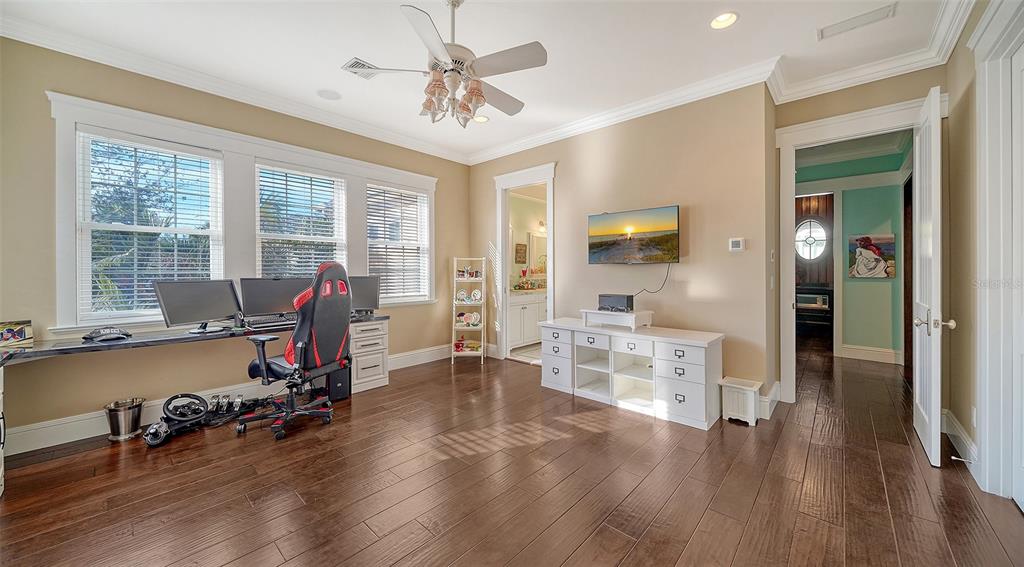 5309 Hidden Harbor Road Sarasota, FL 34242 - Photo 69 of 100 a view of a livingroom with workspace and a window