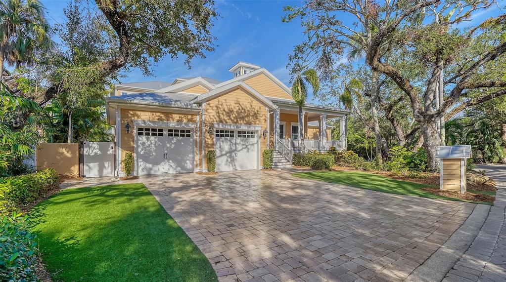 5309 Hidden Harbor Road Sarasota, FL 34242 - Photo 9 of 100 a view of a house with a yard and pathway