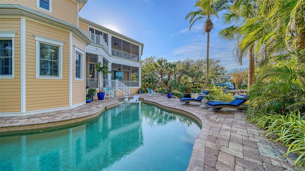 5309 Hidden Harbor Road Sarasota, FL 34242 - Photo 99 of 100 a house with swimming pool in front of it