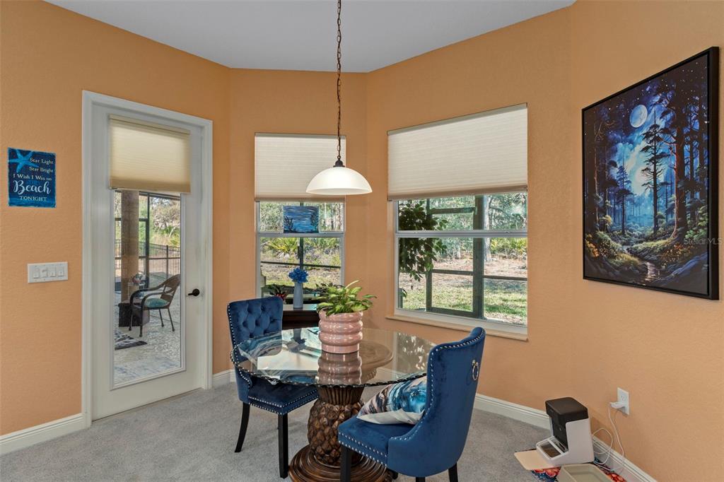 39 Linder Street Homosassa, FL 34446 - Photo 18 of 63 a dining room with furniture and window