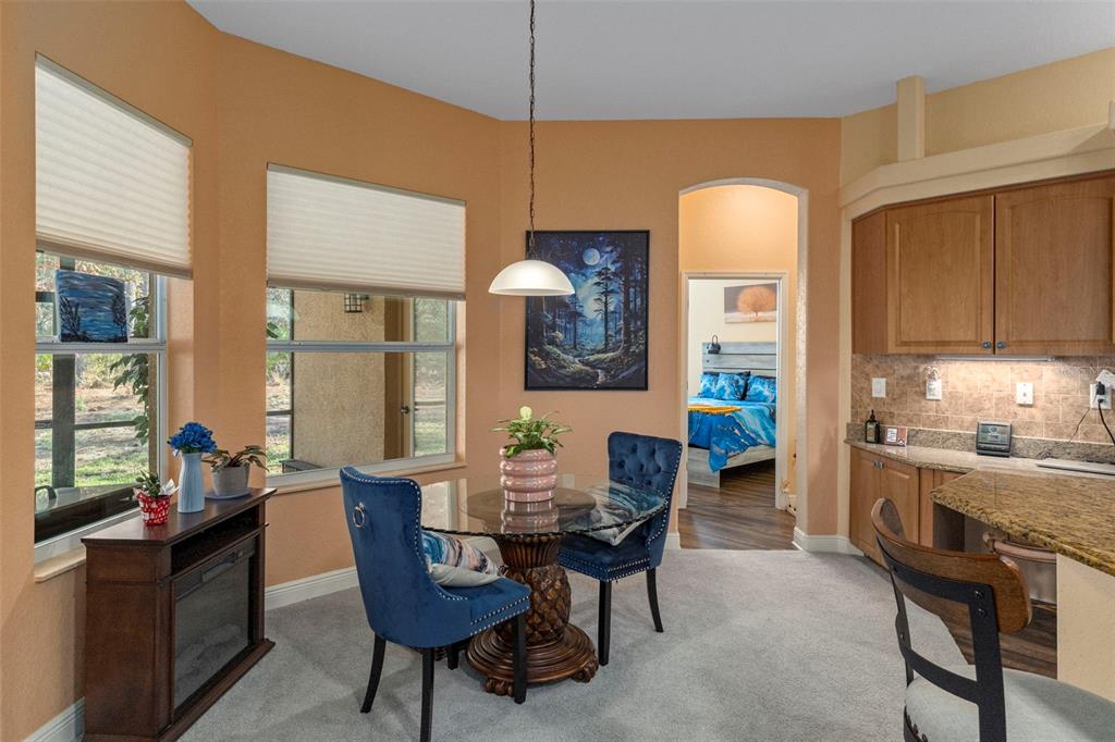 39 Linder Street Homosassa, FL 34446 - Photo 19 of 63 a view of a dining room with furniture and window