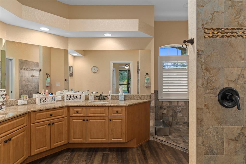39 Linder Street Homosassa, FL 34446 - Photo 29 of 63 a bathroom with a sink and a mirror