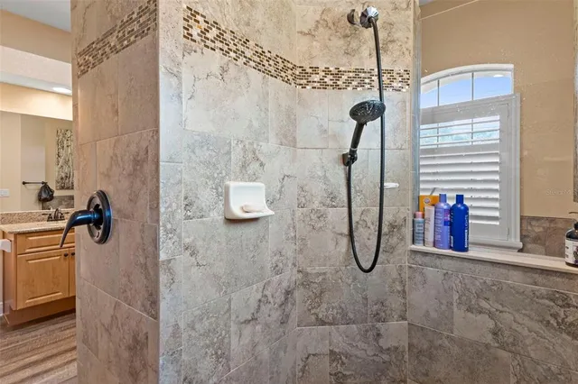 a view of a livingroom with furniture and windows