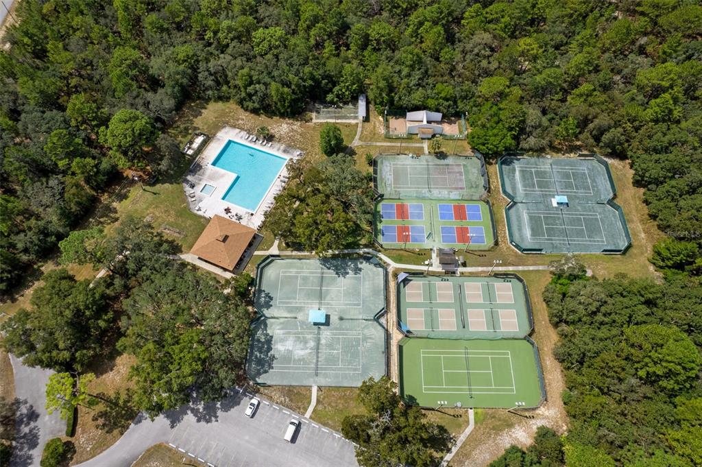 39 Linder Street Homosassa, FL 34446 - Photo 49 of 63 an aerial view of a house with a yard and garden