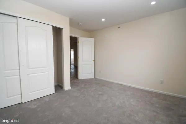a bathroom with a sink and vanity