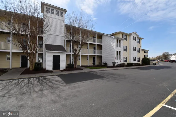 a view of multiple building with a street