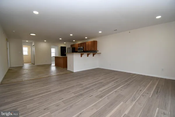 a view of a kitchen with a sink