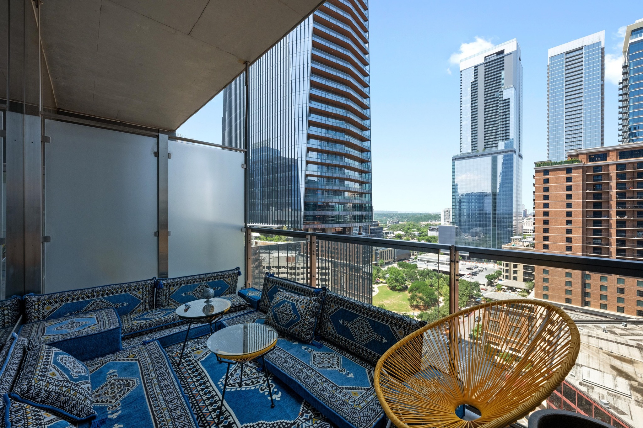 210 Lavaca Street, Unit 1911 Austin, TX 78701 - Photo 3 of 18 a balcony with table and chairs
