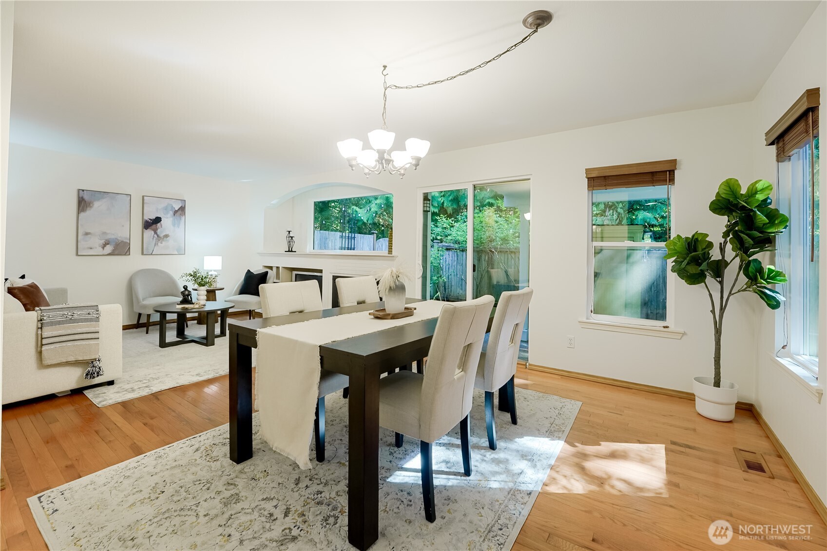 2201 192nd Street Southeast, Unit P4 Bothell, WA 98012 - Photo 11 of 28 a view of a dining room with furniture window and wooden floor