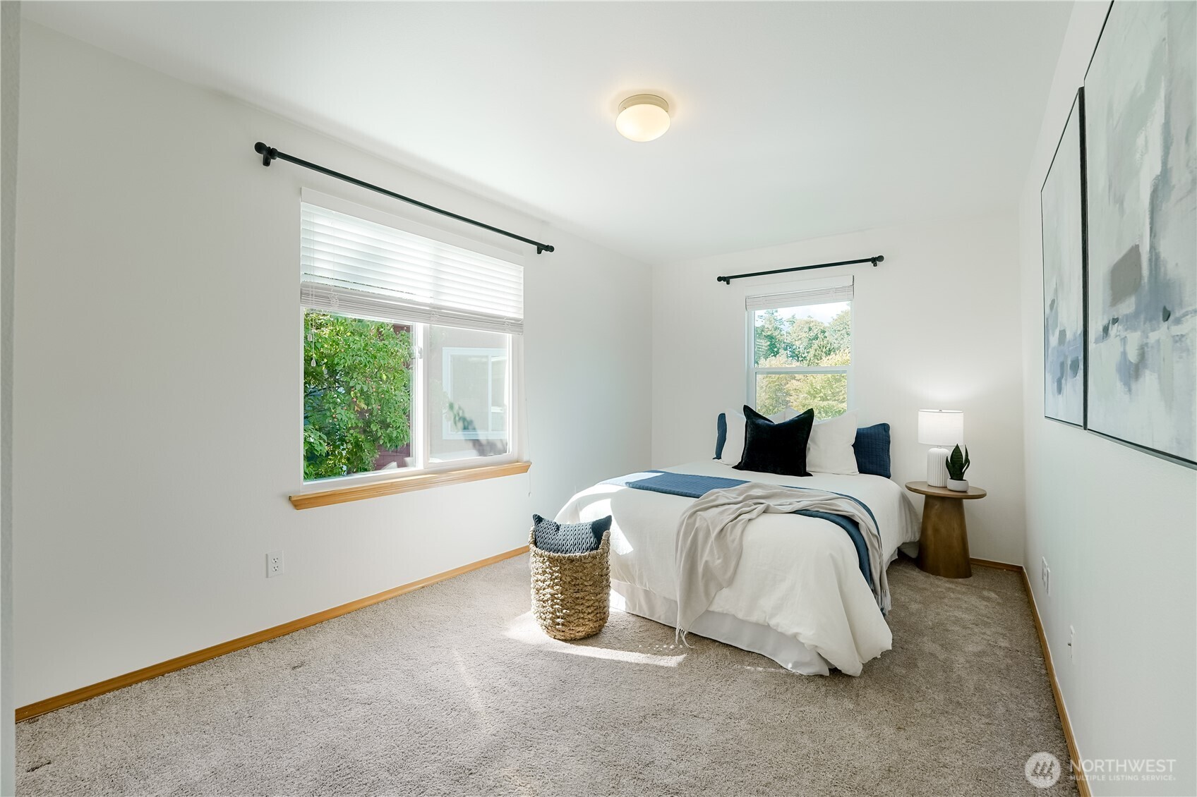 2201 192nd Street Southeast, Unit P4 Bothell, WA 98012 - Photo 22 of 28 a spacious bedroom with a bed and window